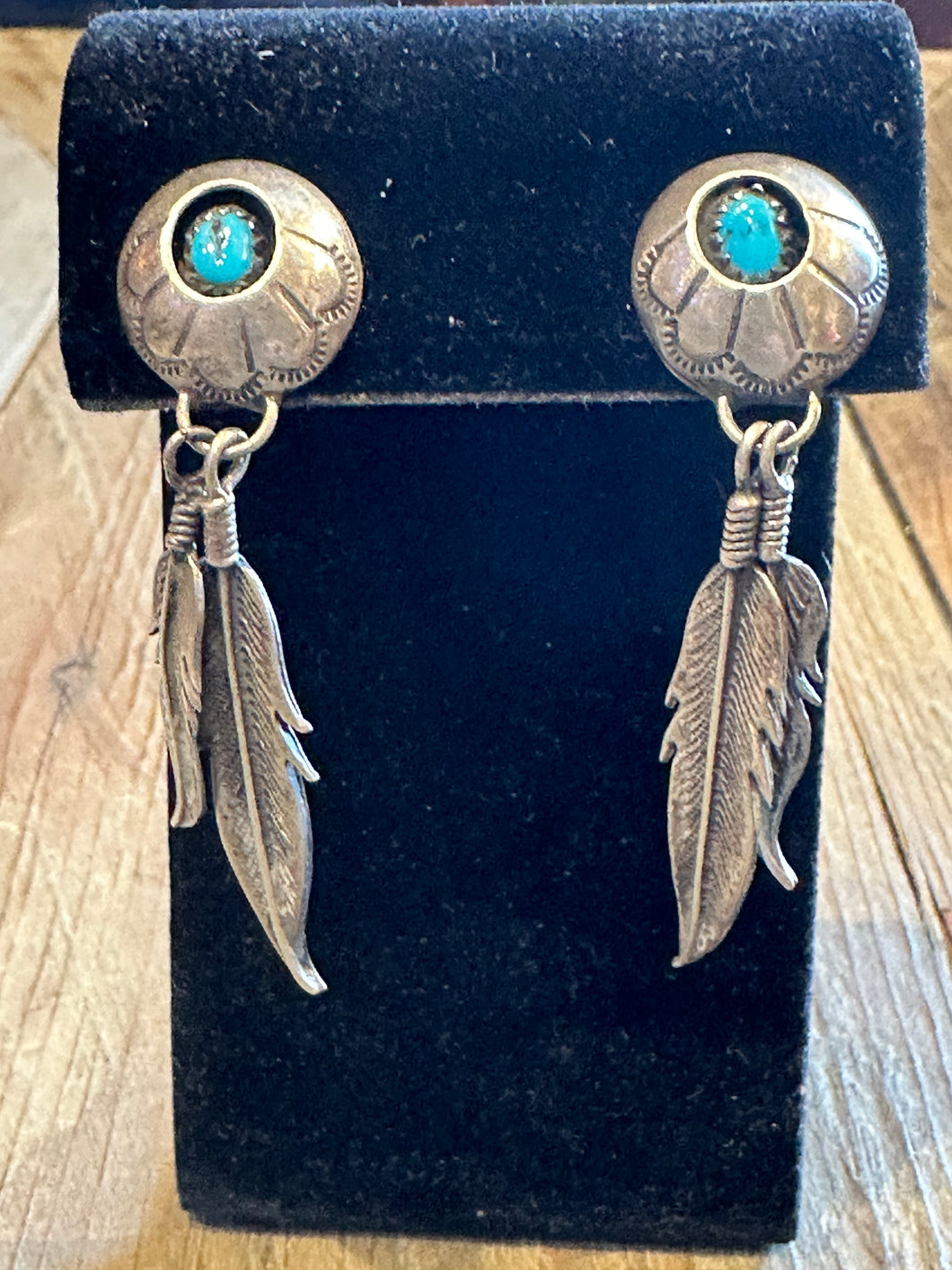 Old Pawn concho earrings with feathers