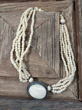 Load image into Gallery viewer, 5 Strand Bone Bead Necklace with Bone Cameo
