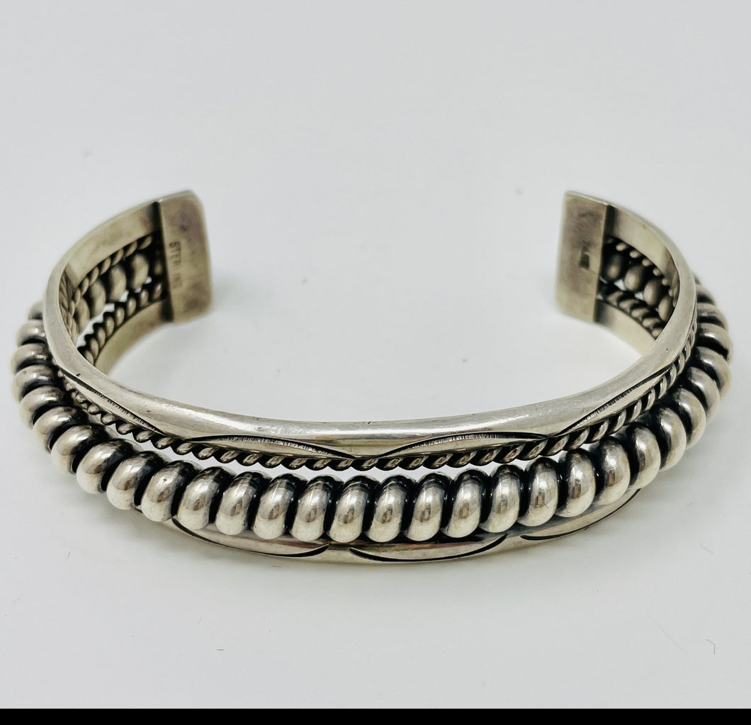 Navajo Silver Cuff with Spiral Center Surrounded by Smaller Spirals and Stampwork