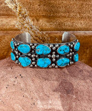 Load image into Gallery viewer, Navajo Sterling Silver Cuff Bracelet featuring 10 gorgeous Turquoise Stones
