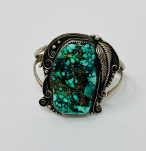 Load image into Gallery viewer, Heavy Navajo Cuff with Raindrops and Stampwork on Leaves Surrounding Stunning Turquoise Stone
