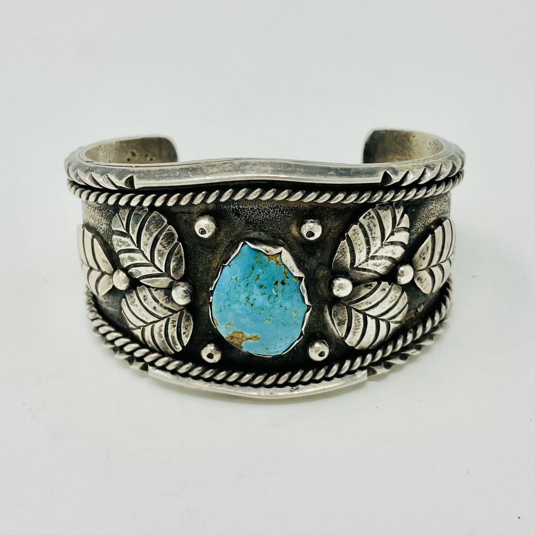 Navajo Cuff with Turquoise Cabochon and Stamped Leaf Embellishment