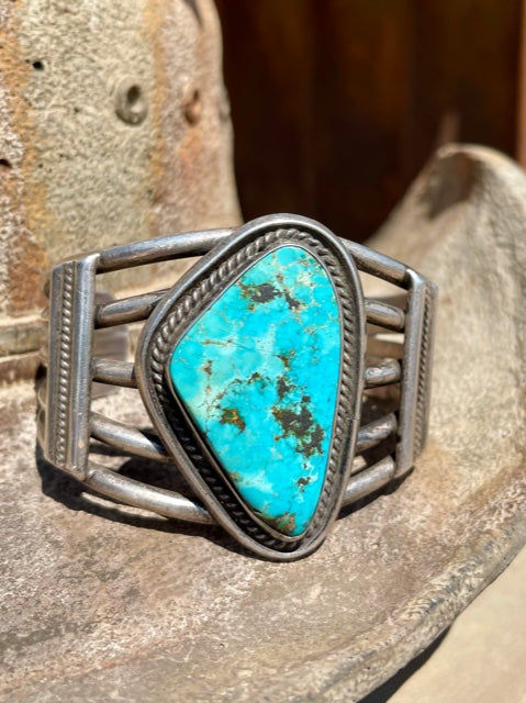 Large Navajo Sterling Silver Cuff featuring an enormous Turquoise Stone and 5 Hand Pulled Shanks
